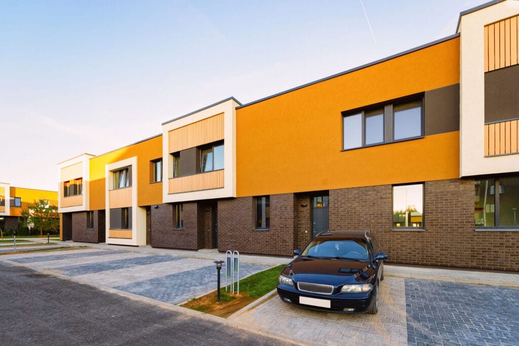 نمای ساختمان شهرکی؛ راهنمای جامع انتخاب و طراحی نما - AdobeStock 303929143 انواع متریالهای مورد استفاده در نمای ساختمان شهرکی